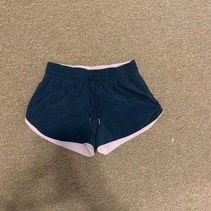 Lululemon shorts, lightly worn, navy blue with pink lining